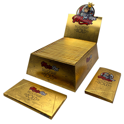 Gold packaging of Monkey King Billionaire Gold cigarettes with brand logo on a white background