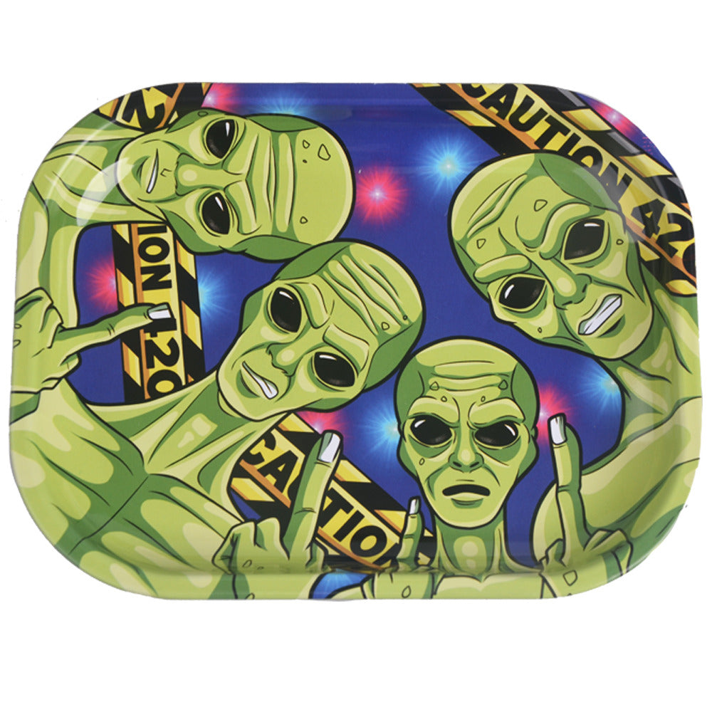 Metal tray with green alien design and 'Caution' signs on a colorful background