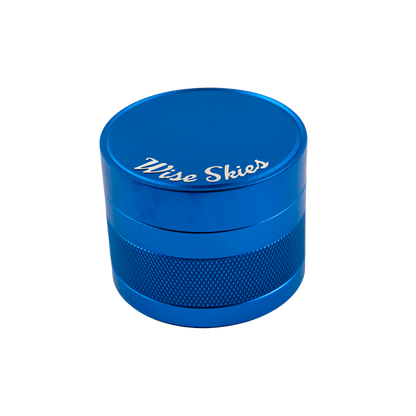 Blue grinder with 'Wise Skies' branding on a white background