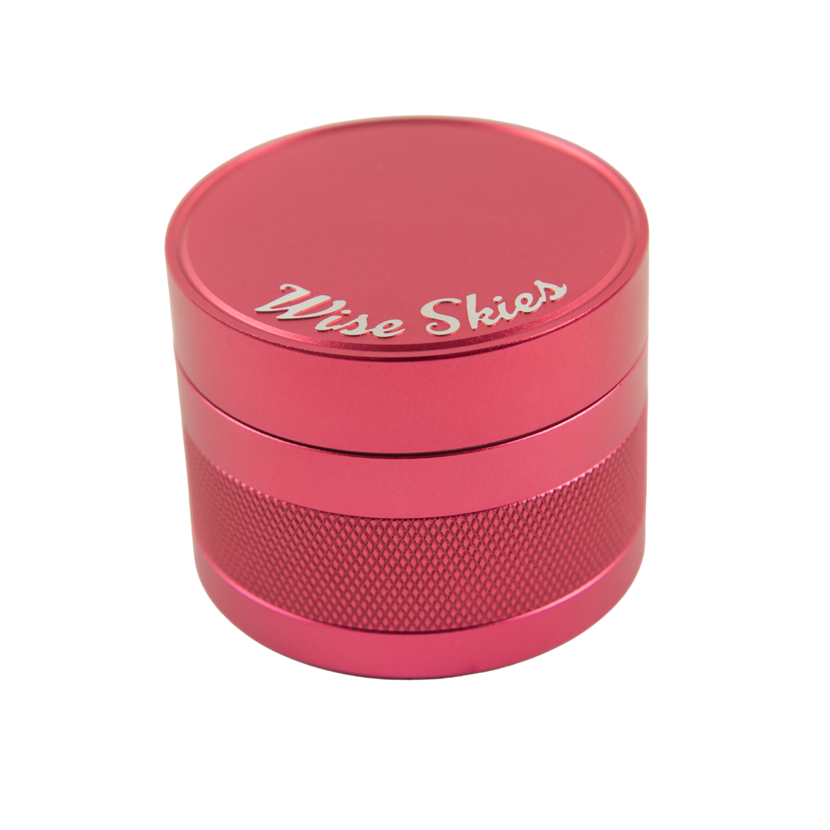 Pink metal grinder with 'Wise Skies' branding on a white background