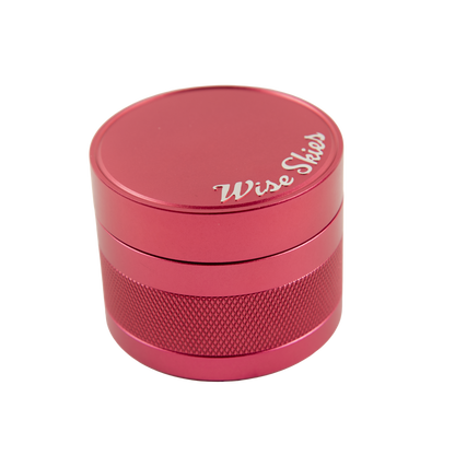 Red metal grinder with 'Wise Slices' branding on a white background