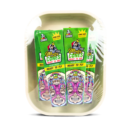 Two packs of 'Monkey King Cones' on a white tray with colorful packaging.