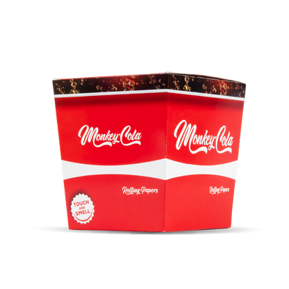 Red packaging with 'Monkey Cola' branding on a white background