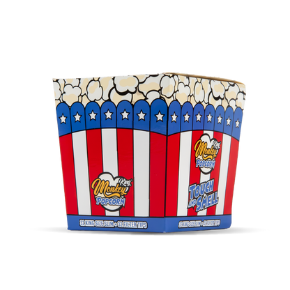 Popcorn bucket with red, white, and blue design featuring a monkey popcorn logo.