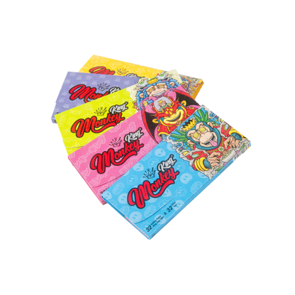 Colorful packages of Red Monkey candy on a white background
